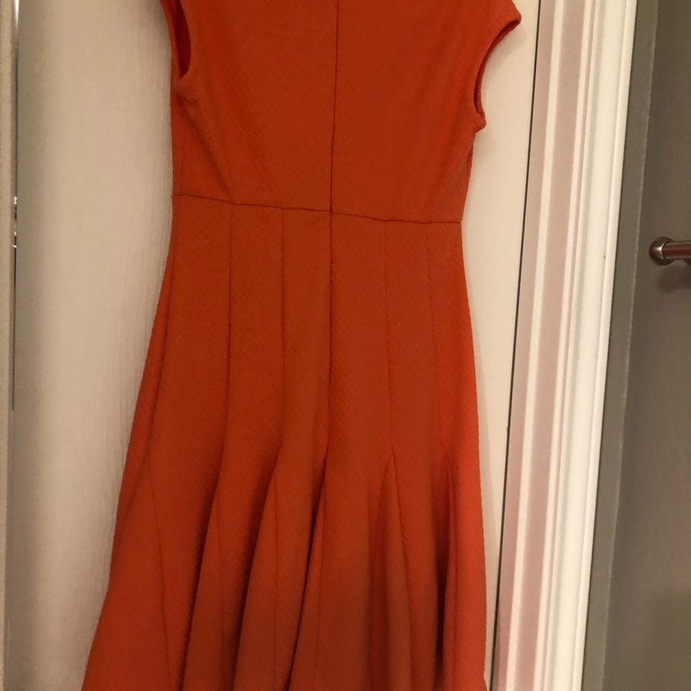 Zipper in back.